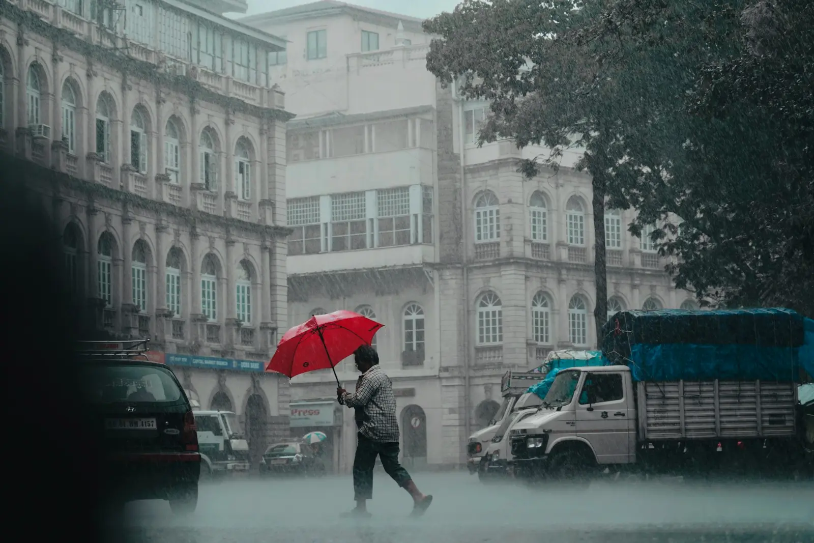 Mumbai rain red alert today causes flooding and train cancellations.
